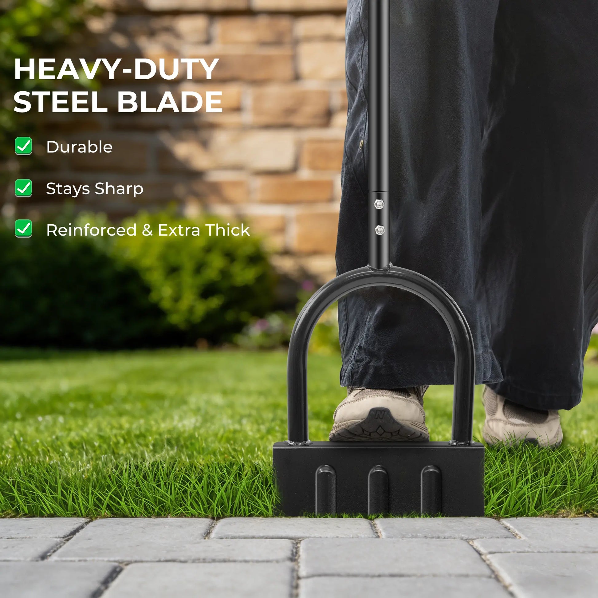 Person using a snow shovel with text highlighting features on a grassy area.