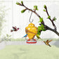 Dwellcozy yellow bird feeder with a hook on a branch, surrounded by animated hummingbirds.