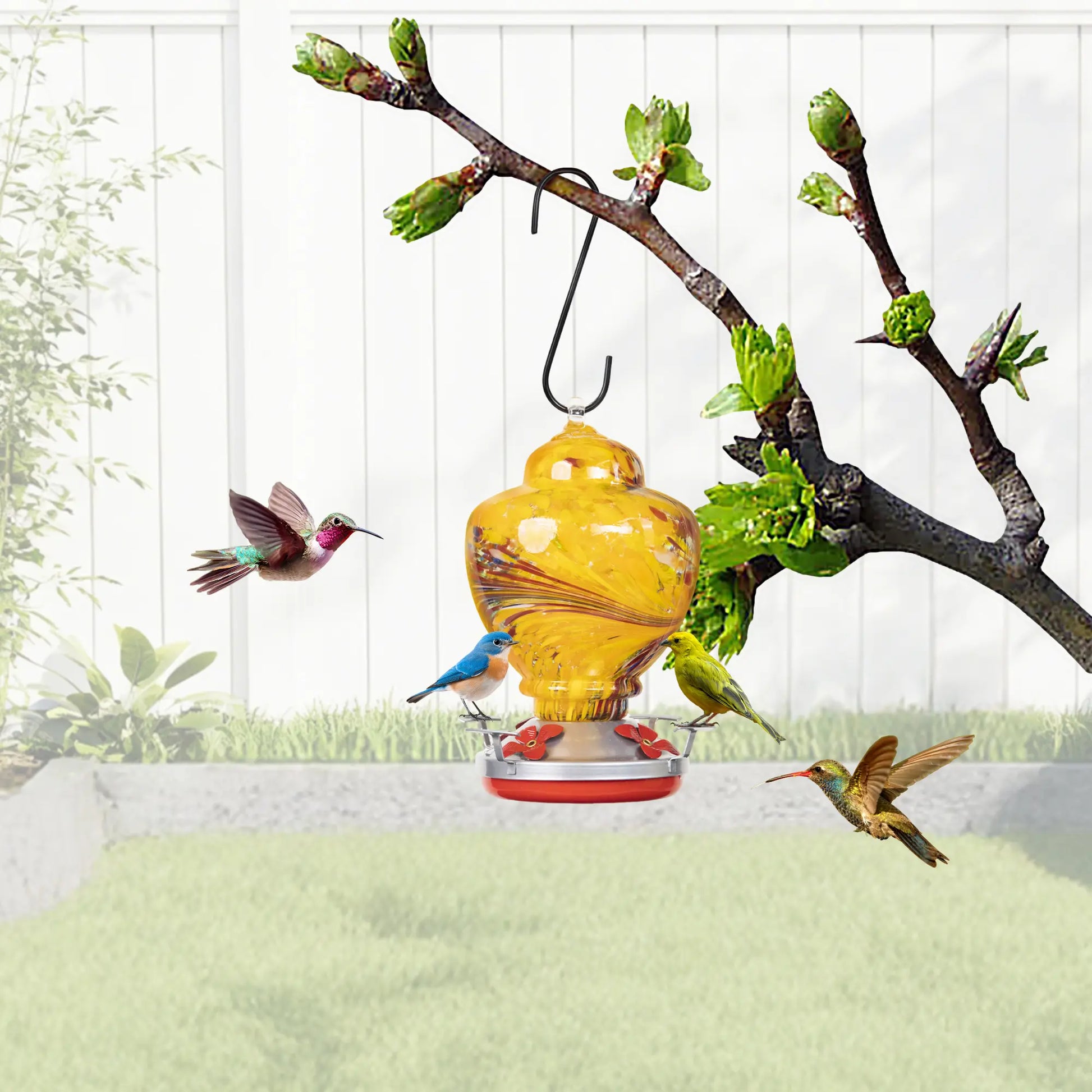 Dwellcozy yellow bird feeder with a hook on a branch, surrounded by animated hummingbirds.
