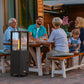 Dwellcozy wood pellet patio heater warms the time with family.
